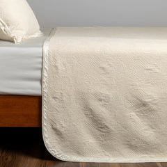 Trettino Bedspread from Bella Notte Linens in the color Natural.