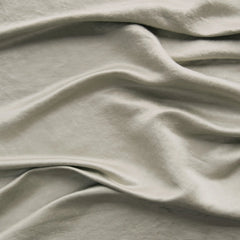 Paloma Round Pillow from Bella Notte Linens in the color Fog.