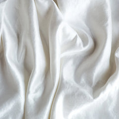 Paloma Round Pillow from Bella Notte Linens in the color White.